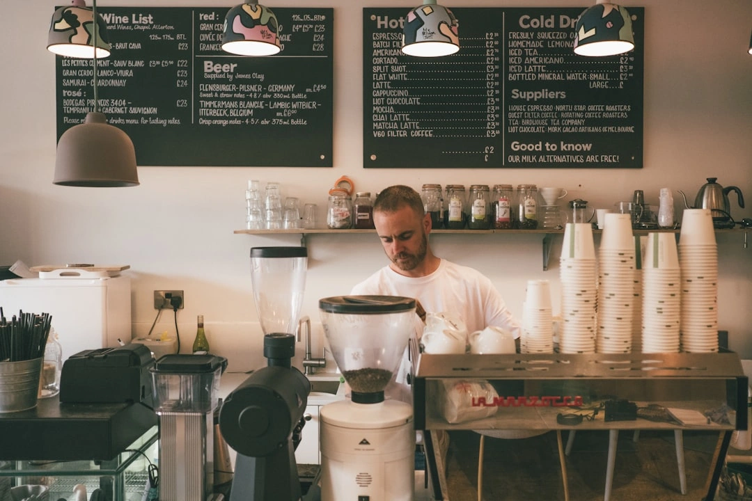 A coffee shop with a business owner working