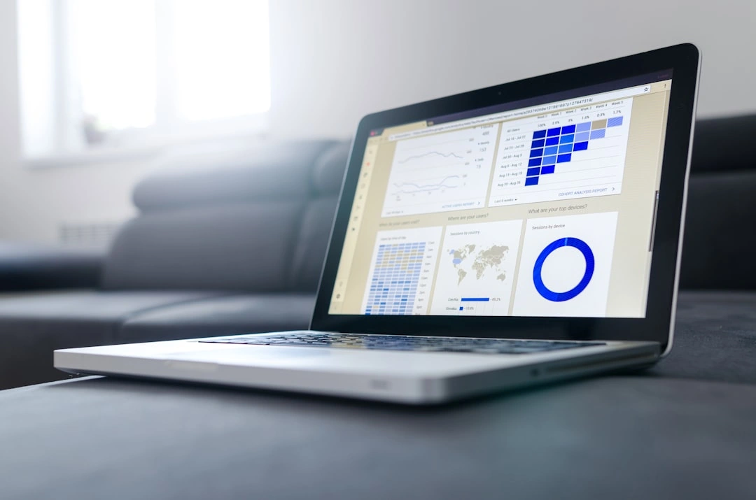 laptop with charts and graphs
